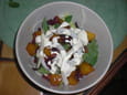 Salade ti�de de lardons � la mangue