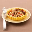 Tarte au lapin, tapenade et tomates confites