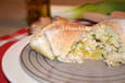 Pizza calzone au poulet, poireaux et champignons