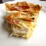 Tarte fine aux endives, pancetta et fromage filant
