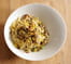 Coques et moules � la mangue et lait de coco sur lit de spaghetti