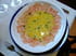 Carpaccio de citriques aux baies et aux olives noires