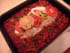 Poisson au four sur un lit de l�gumes