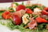 Salade de roquette aux fraises, vinaigrette au miel