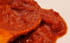 C�te de porc � la sauce tomate et cornichons